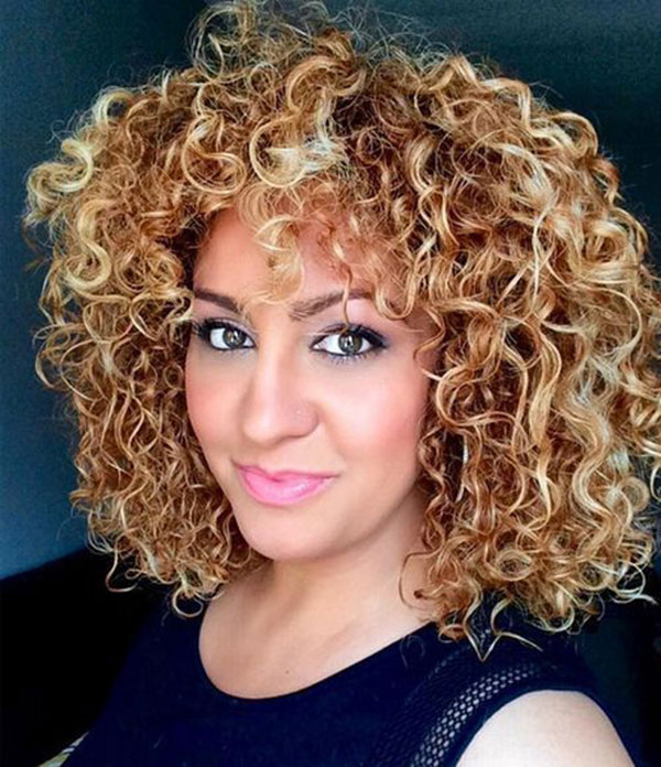 Curly Caramel Hair with Blonde Highlights